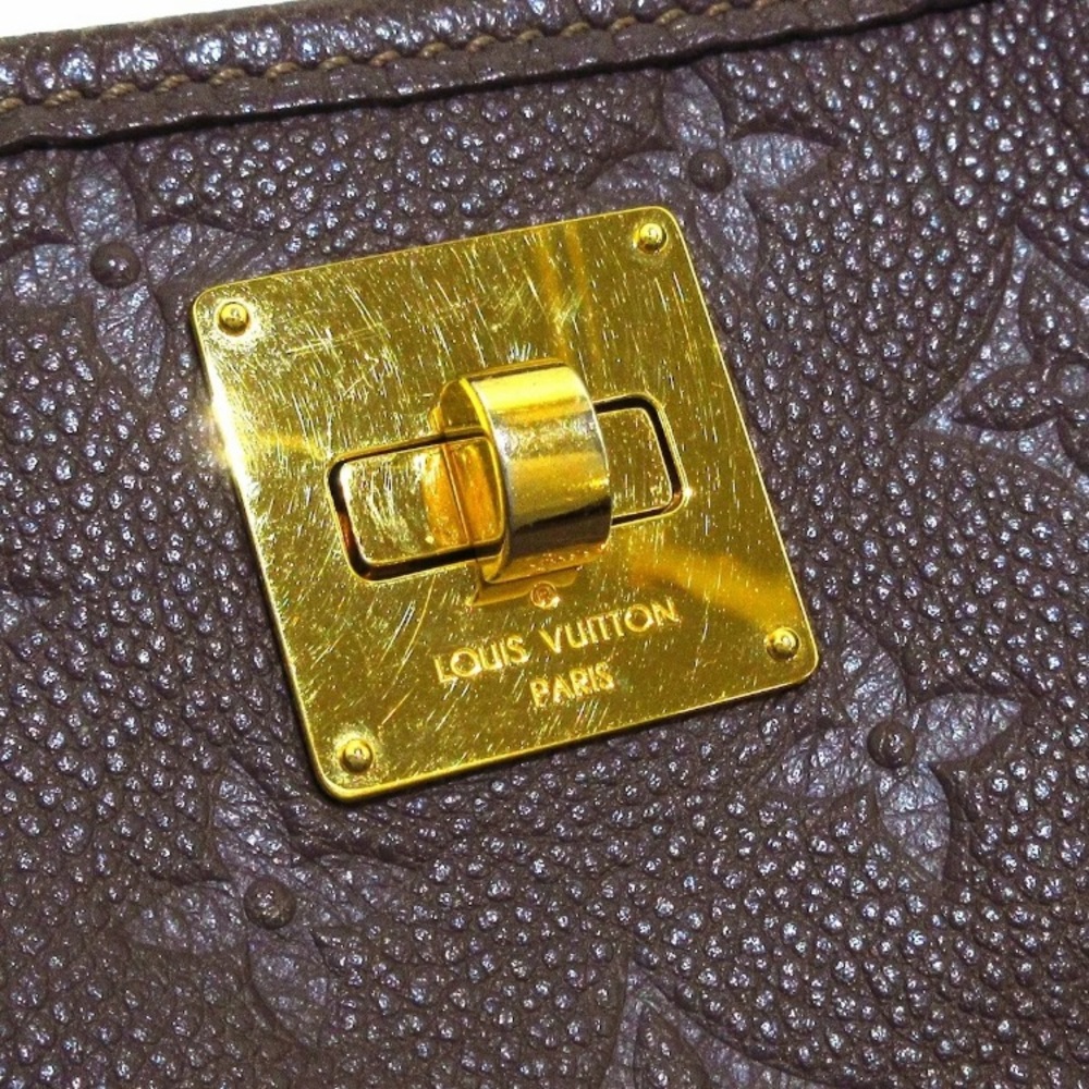 Louis Vuitton LEATHER TOTE AND POUCH BAG - Picture 10 of 11